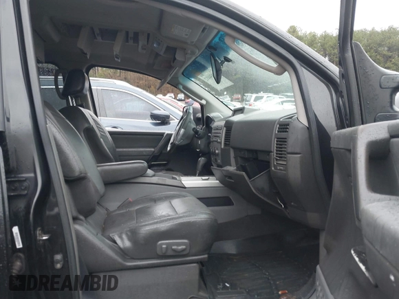 2007 Nissan Titan SE with VIN 1N6BA07A17N212890, listed as a IAAI auction lot 41034412 with 211,881 mi miles and . Bid and sale history available at DreamBid. Image 5.