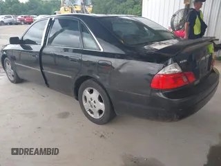 2003 Toyota Avalon XL z VIN 4T1BF28B33U291465, wystawiony jako IAAI lot #42482001 z przebiegiem 203 028 mil mil oraz . Historia ofert i sprzedaży dostępna na DreamBid. Obrazek 3.