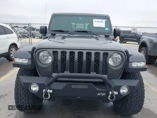 2020 Jeep Gladiator Rubicon with VIN 1C6JJTBG8LL135573, listed as a IAAI auction lot 41585896 with 79,070 mi miles and . Bid and sale history available at DreamBid. Image 12.
