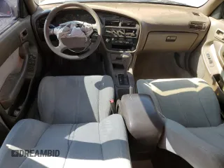 1993 Toyota Camry LE z VIN 4T1SK12E7PU287093, wystawiony jako Copart lot #55682275 z przebiegiem 110 399 mil mil oraz Szkoda całkowita • Salvage title. Historia ofert i sprzedaży dostępna na DreamBid. Obrazek 8.