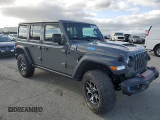 2020 Jeep Wrangler Unlimited Rubicon with VIN 1C4HJXFN9LW156972, listed as a Copart auction lot 50666195 with 13,834 mi miles and Salvage title. Bid and sale history available at DreamBid. Image 4.