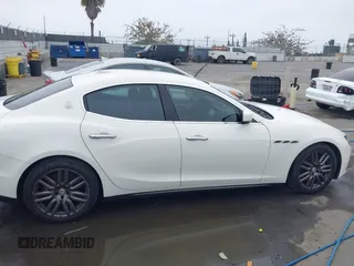2015 Maserati Ghibli z VIN ZAM57XSA3F1154376, wystawiony jako IAAI lot #42373053 z przebiegiem 81 523 mil mil oraz . Historia ofert i sprzedaży dostępna na DreamBid. Obrazek 13.