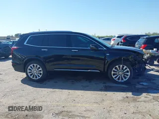 2020 Cadillac XT6 FWD Premium Luxury z VIN 1GYKPERS0LZ232338, wystawiony jako IAAI lot #41845562 z przebiegiem 86 839 mil mil oraz . Historia ofert i sprzedaży dostępna na DreamBid. Obrazek 13.