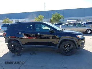 2018 Jeep Compass Latitude with VIN 3C4NJCBB3JT501939, listed as a IAAI auction lot 41670306 with 93,767 mi miles. Bid and sale history available at carsss.com. Image 14.