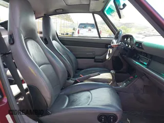 1997 Porsche 911 with VIN WP0AA2998VS322699, listed as a IAAI auction lot 41892833 with 117,174 mi miles and . Bid and sale history available at DreamBid. Image 5.