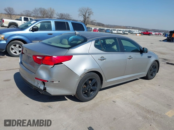 2015 Kia Optima LX with VIN 5XXGM4A78FG477630, listed as a IAAI auction lot 41771874 with 107,065 mi miles and . Bid and sale history available at DreamBid. Image 12.