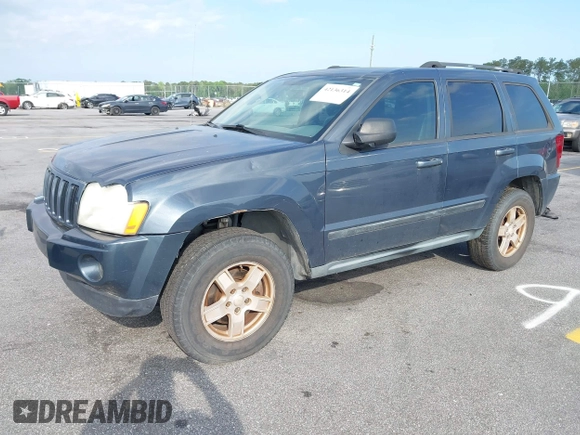 2007 Jeep Grand Cherokee Laredo with VIN 1J8GS48K17C684497, listed as a IAAI auction lot 42136314 with 155,024 mi miles. Bid and sale history available at carsss.com. Image 2.