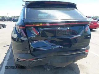 2022 Hyundai Tucson SEL z VIN 5NMJFCAE5NH046879, wystawiony jako IAAI lot #42295125 z przebiegiem 24 448 mil mil oraz . Historia ofert i sprzedaży dostępna na DreamBid. Obrazek 17.