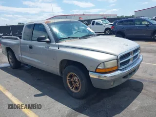 1999 Dodge Dakota SLT z VIN 1B7GL22X9XS258964, wystawiony jako IAAI lot #42309862 z przebiegiem 177 561 mil mil oraz . Historia ofert i sprzedaży dostępna na DreamBid. Obrazek 1.