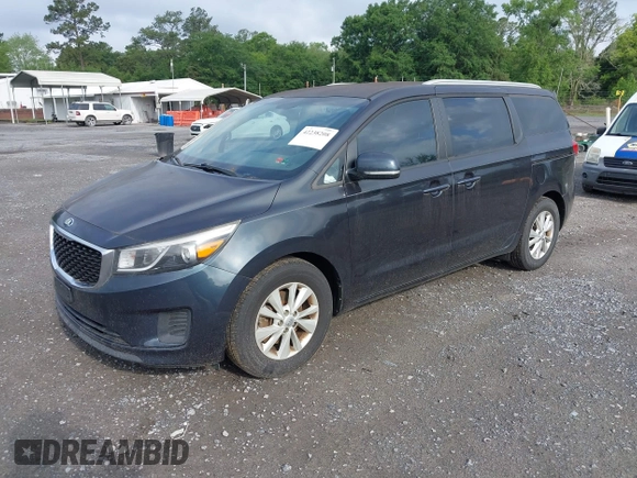 2016 Kia Sedona LX with VIN KNDMB5C16G6188852, listed as a IAAI auction lot 42238208 with 117,045 mi miles and . Bid and sale history available at DreamBid. Image 2.
