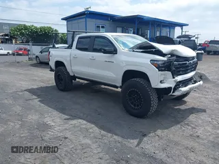 2023 Chevrolet Colorado 4WD Z71 with VIN 1GCPTDEK9P1219177, listed as a IAAI auction lot 42226373 with 26,238 mi miles and . Bid and sale history available at DreamBid. Image 1.