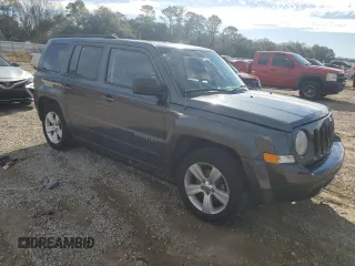 2015 Jeep Patriot Latitude with VIN 1C4NJPFBXFD281214, listed as a Copart auction lot 87883615 with 106,402 mi miles and Salvage Title. Bid and sale history available at DreamBid. Image 4.