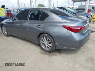 2021 Infiniti Q50 Pure with VIN JN1EV7AP3MM704464, listed as a IAAI auction lot 41915813 with 28,596 mi miles and . Bid and sale history available at DreamBid. Image 3.
