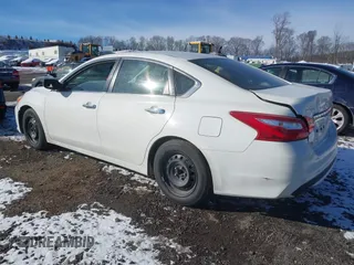 2016 Nissan Altima S with VIN 1N4AL3AP0GN346299, listed as a IAAI auction lot 41175192 with 139,856 mi miles and . Bid and sale history available at carsss.com. Image 3.
