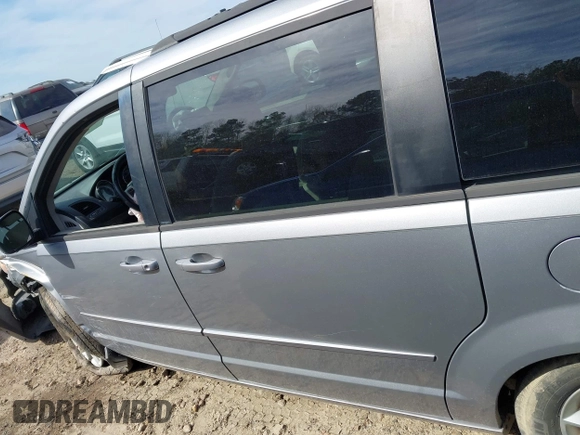 2014 Dodge Grand Caravan SXT with VIN 2C4RDGCG4ER106106, listed as a IAAI auction lot 41830512 with 135,044 mi miles and . Bid and sale history available at DreamBid. Image 14.