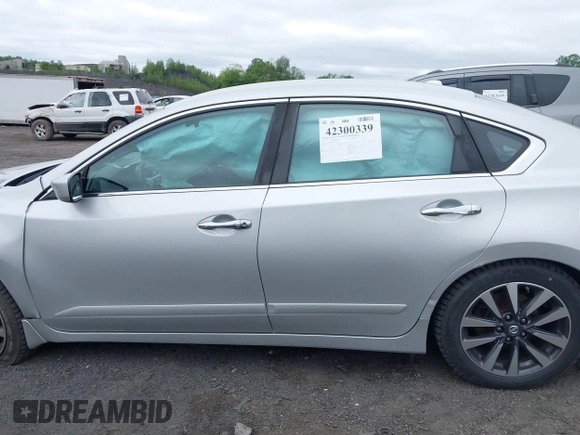 2017 Nissan Altima S z VIN 1N4AL3AP2HC239414, wystawiony jako IAAI lot #42300339 z przebiegiem 98 643 mil mil oraz . Historia ofert i sprzedaży dostępna na DreamBid. Obrazek 14.