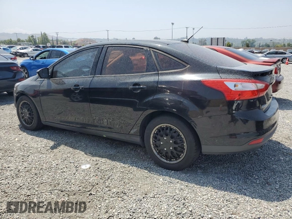2012 Ford Focus SE with VIN 1FAHP3F22CL372232, listed as a Copart auction lot 59637645 with 134,337 mi miles and Salvage title. Bid and sale history available at DreamBid. Image 2.