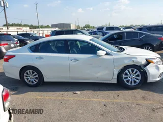 2016 Nissan Altima S z VIN 1N4AL3APXGC236145, wystawiony jako IAAI lot #41883454 z przebiegiem 47 167 mil mil oraz . Historia ofert i sprzedaży dostępna na DreamBid. Obrazek 13.