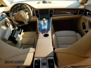2014 Porsche Panamera с VIN WP0AA2A77EL008465, выставлен на аукционе Copart как лот 69671134 с пробегом Не указан миль и Чистый • Clean title. История ставок и продаж доступна на DreamBid. Изображение 8.