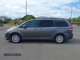 2011 Toyota Sienna XLE AAS with VIN 5TDYK3DC3BS059501, listed as a IAAI auction lot 42185225 with 143,416 mi miles. Bid and sale history available at carsss.com. Image 14.