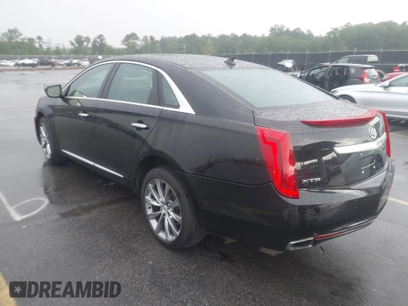 2013 Cadillac XTS Premium z VIN 2G61S5S39D9112491, wystawiony jako IAAI lot #42216373 z przebiegiem 145 338 mil mil oraz . Historia ofert i sprzedaży dostępna na DreamBid. Obrazek 3.