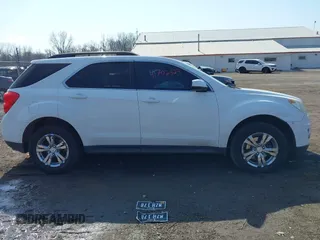 2013 Chevrolet Equinox LT z VIN 2GNALPEKXD1266206, wystawiony jako IAAI lot #41702923 z przebiegiem 196 616 mil mil oraz . Historia ofert i sprzedaży dostępna na DreamBid. Obrazek 13.