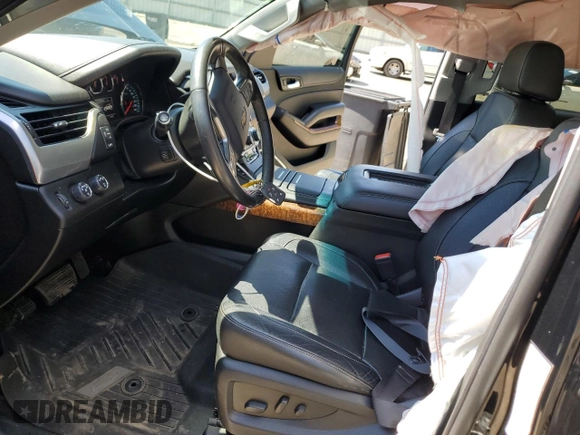 2018 Chevrolet Tahoe Premier with VIN 1GNSKCKC1JR133625, listed as a Copart auction lot 54900974 with 130,921 mi miles and Salvage title. Bid and sale history available at DreamBid. Image 7.