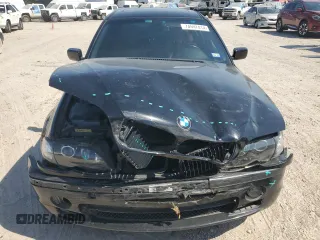 2005 BMW 3 Series 330i with VIN WBAEV53405KM43213, listed as a Copart auction lot 74597414 with 182,881 mi miles and Salvage Title. Bid and sale history available at carsss.com. Image 5.