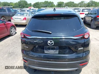 2016 Mazda CX-9 Touring with VIN JM3TCACY7G0101632, listed as a IAAI auction lot 42191115 with 163,070 mi miles and . Bid and sale history available at DreamBid. Image 16.