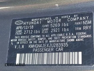 2018 Genesis G80 3.8L z VIN KMHGN4JEXJU283935, wystawiony jako IAAI lot #41750441 z przebiegiem 70 165 mil mil oraz . Historia ofert i sprzedaży dostępna na DreamBid. Obrazek 9.