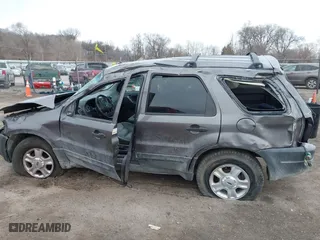 2004 Ford Escape XLT with VIN 1FMCU93104KA88855, listed as a IAAI auction lot 41433173 with 136,355 mi miles. Bid and sale history available at carsss.com. Image 15.