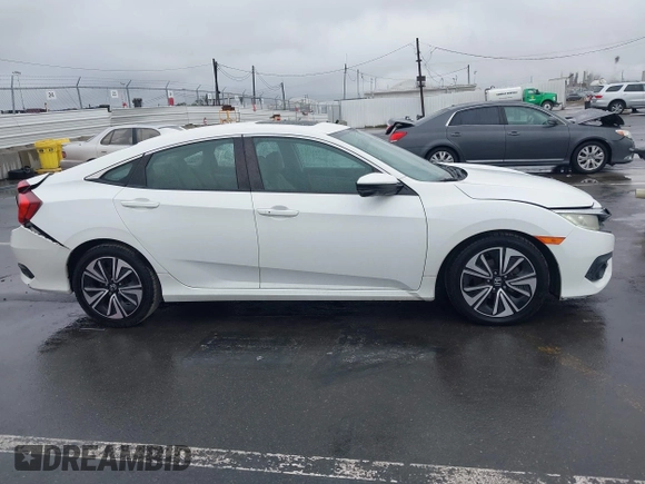 2016 Honda Civic Sedan EX-L with VIN 2HGFC1F78GH648639, listed as a IAAI auction lot 41895039 with 121,072 mi miles. Bid and sale history available at carsss.com. Image 13.