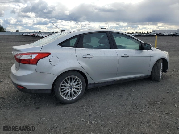 2012 Ford Focus SEL with VIN 1FAHP3H24CL453391, listed as a Copart auction lot 51345695 with 173,971 mi miles and Salvage Title. Bid and sale history available at carsss.com. Image 3.