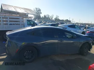 2024 Toyota Prius SE z VIN JTDACACU4R3013796, wystawiony jako IAAI lot #41866441 z przebiegiem 49 837 mil mil oraz . Historia ofert i sprzedaży dostępna na DreamBid. Obrazek 14.