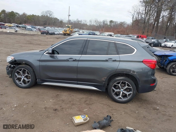 2017 BMW X1 xDrive28i with VIN WBXHT3C37H5F86637, listed as a IAAI auction lot 41300161 with 95,459 mi miles. Bid and sale history available at carsss.com. Image 14.
