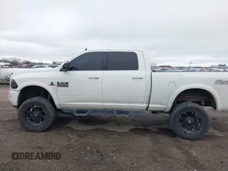 2017 Ram 2500 Laramie z VIN 3C6UR5FL7HG749723, wystawiony jako IAAI lot #41523969 z przebiegiem 133 622 mil mil oraz . Historia ofert i sprzedaży dostępna na DreamBid. Obrazek 14.