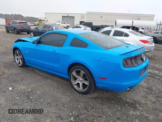 2013 Ford Mustang GT with VIN 1ZVBP8CF4D5268218, listed as a IAAI auction lot 41555868 with 219,385 mi miles. Bid and sale history available at carsss.com. Image 3.
