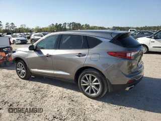 2023 Acura RDX Technology with VIN 5J8TC1H59PL004665, listed as a Copart auction lot 50383935 with 14,242 mi miles and Salvage title. Bid and sale history available at DreamBid. Image 2.