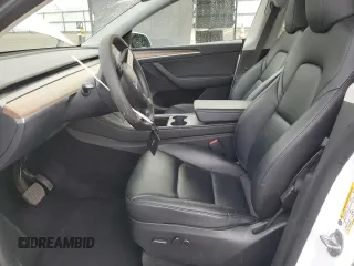 2023 Tesla Model Y Long Range z VIN 7SAYGAEE5PF743079, wystawiony jako Copart lot #45570655 z przebiegiem 46 145 mil mil oraz Szkoda całkowita • Salvage title. Historia ofert i sprzedaży dostępna na DreamBid. Obrazek 7.