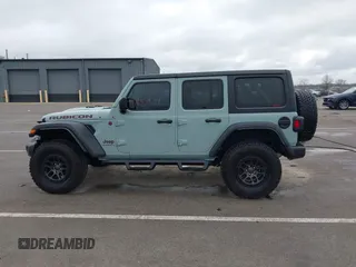 2023 Jeep Wrangler Rubicon with VIN 1C4JJXFG7PW654564, listed as a IAAI auction lot 41833534 with 22,277 mi miles and . Bid and sale history available at DreamBid. Image 14.