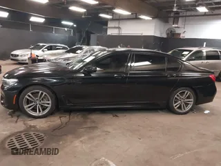 2018 BMW 7 Series 740i xDrive z VIN WBA7E4C51JGV24133, wystawiony jako IAAI lot #42253139 z przebiegiem 77 370 mil mil oraz . Historia ofert i sprzedaży dostępna na DreamBid. Obrazek 14.
