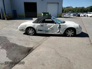 2002 Ford Thunderbird Hardtop Premium with VIN 1FAHP60A32Y125580, listed as a Copart auction lot 77493514 with 74,619 mi miles and Salvage Title. Bid and sale history available at DreamBid. Image 11.