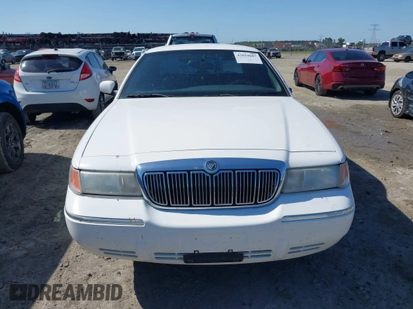 2000 Mercury Grand Marquis LS z VIN 2MEFM75W3YX689323, wystawiony jako IAAI lot #42019687 z przebiegiem 241 045 mil mil oraz . Historia ofert i sprzedaży dostępna na DreamBid. Obrazek 12.