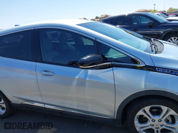 2017 Chevrolet Bolt EV LT z VIN 1G1FW6S08H4185243, wystawiony jako IAAI lot #42184763 z przebiegiem 78 347 mil mil oraz . Historia ofert i sprzedaży dostępna na DreamBid. Obrazek 14.