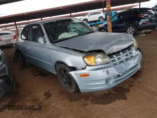 2005 Hyundai Accent GLS with VIN KMHCG35C55U325669, listed as a IAAI auction lot 41797154 with 364,357 mi miles. Bid and sale history available at carsss.com. Image 1.
