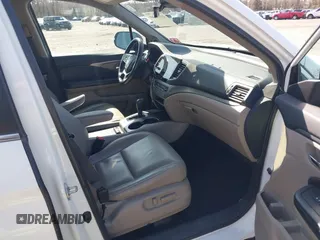 2019 Honda Pilot EX-L with VIN 5FNYF6H51KB052648, listed as a IAAI auction lot 41928269 with 67,878 mi miles and . Bid and sale history available at carsss.com. Image 5.
