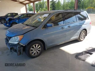 2010 Honda Odyssey EX-L with VIN 5FNRL3H61AB046416, listed as a IAAI auction lot 42157812 with 129,525 mi miles and . Bid and sale history available at DreamBid. Image 2.