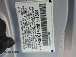 2009 Honda Civic Cpe LX with VIN 2HGFG12629H521583, listed as a Copart auction lot 66502414 with 136,478 mi miles and Salvage Title. Bid and sale history available at carsss.com. Image 14.