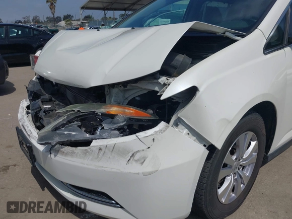 2016 Honda Odyssey SE with VIN 5FNRL5H33GB043303, listed as a IAAI auction lot 42215233 with 67,097 mi miles and . Bid and sale history available at DreamBid. Image 6.