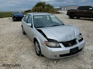 2003 Mazda Protege DX with VIN JM1BJ226631162054, listed as a Copart auction lot 70961034 with 85,794 mi miles and Salvage Title. Bid and sale history available at carsss.com. Image 11.